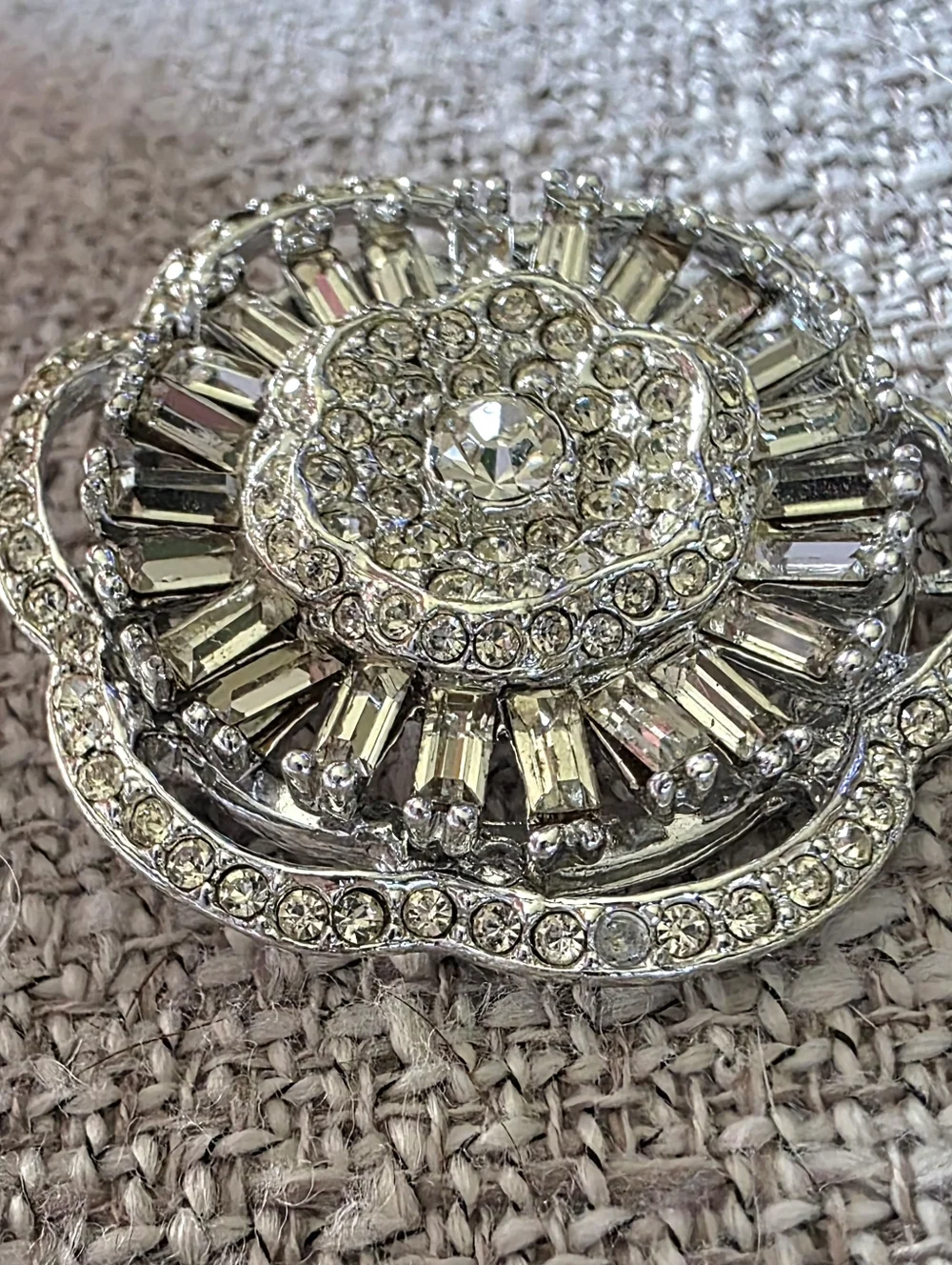 Vintage rhinestone brooch circular, tiered design with clear faceted rhinestones
